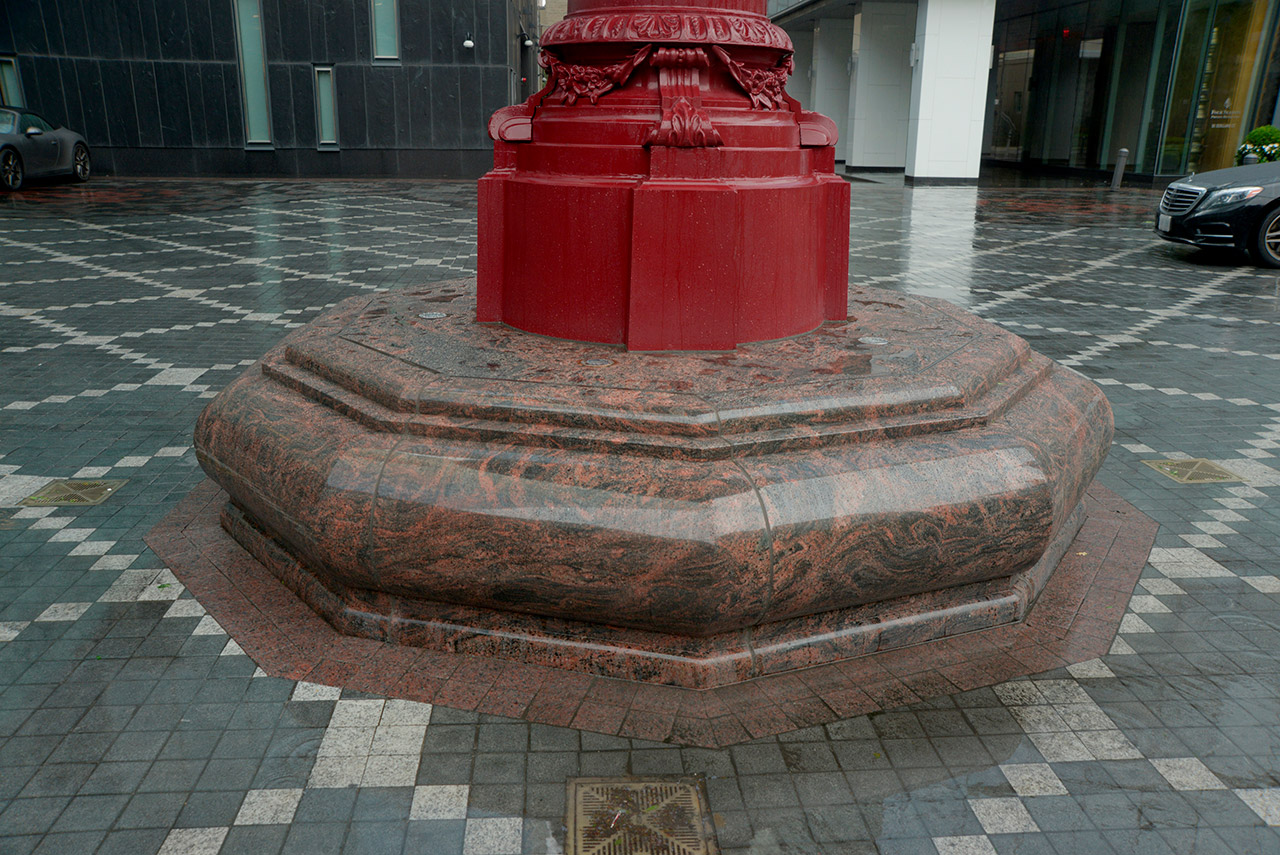 red water fountain on top of granite base for HGH Granite's project at the Four Seasons Hotel