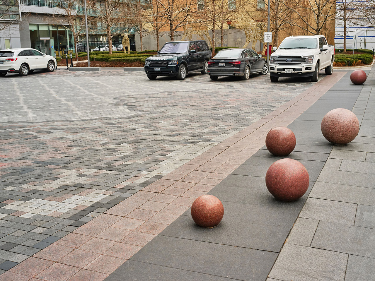 granite spheres strewn across the plaza at the Four Seasons Hotel in Ontario Canada