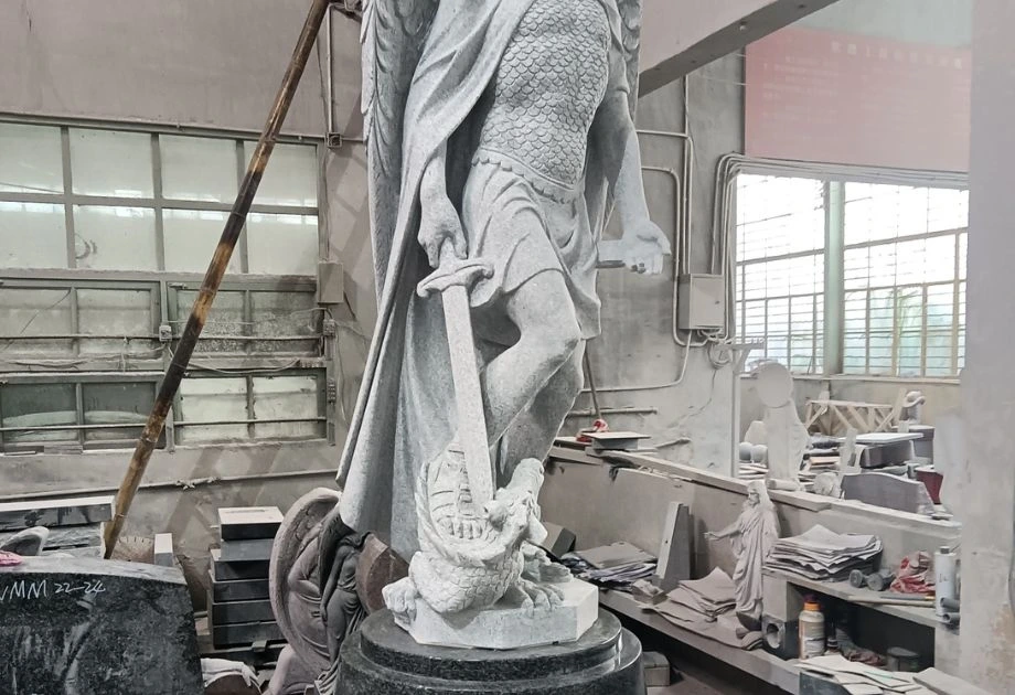 St. Michael statue in workshop near completion