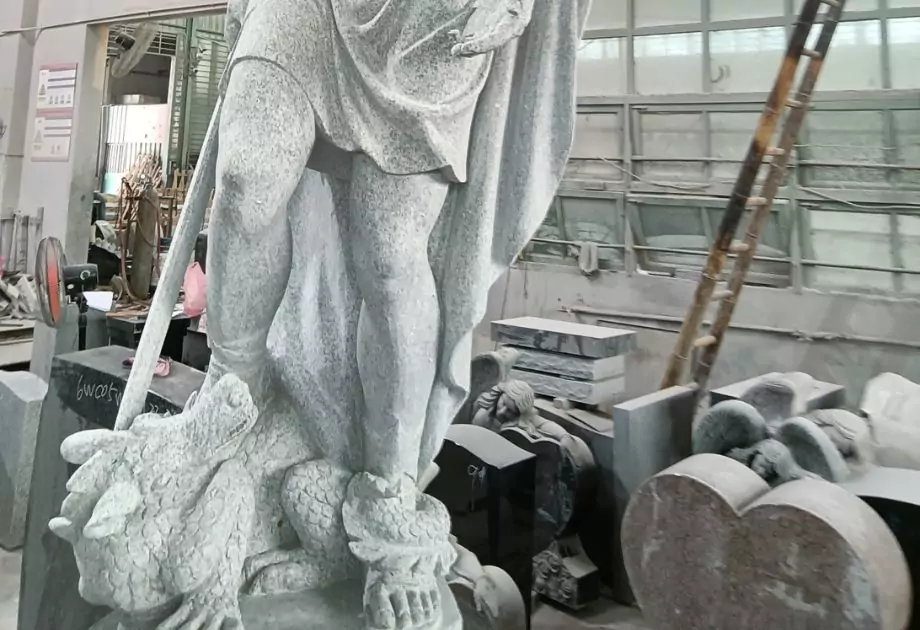 Close up of the St Michael granite sculpture
