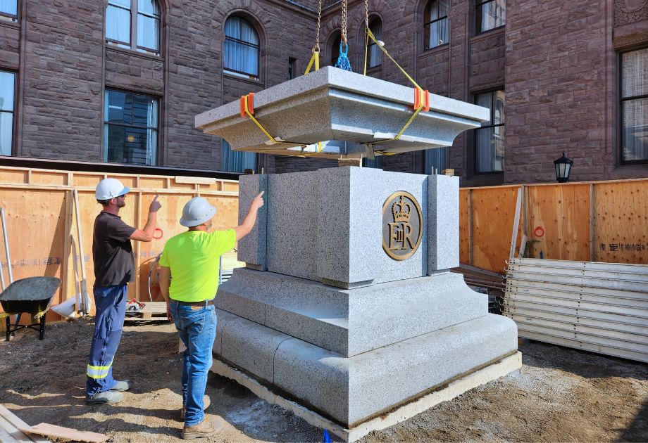 Granite base being installed for the Queen Elizabeth statue