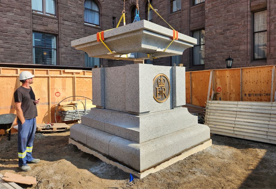 Granite base being installed for the Queen Elizabeth statue