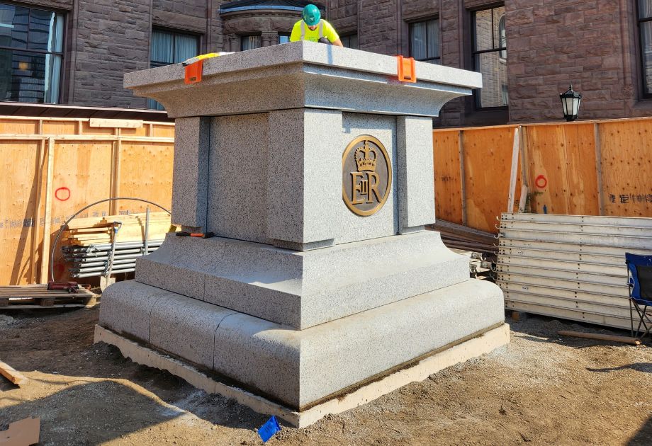 Granite base being installed for the Queen Elizabeth statue