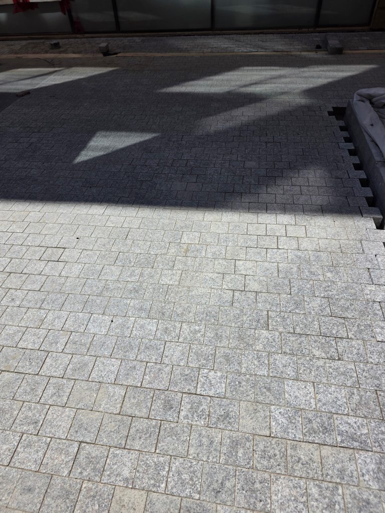 Grey paving at The James