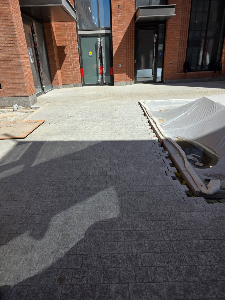 Grey paving at The James