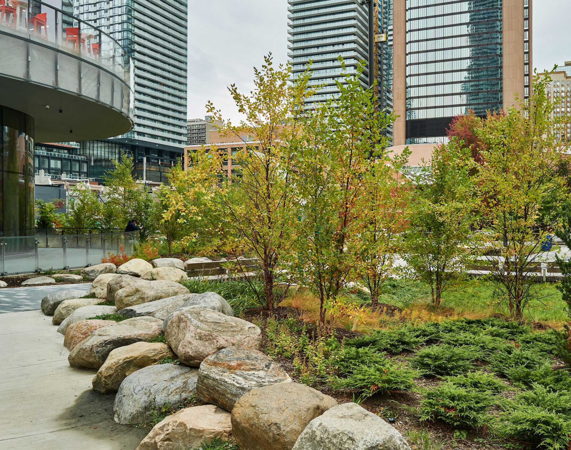Natural stone features woven into the landscape.