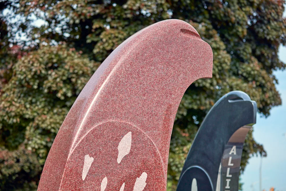 Eagles Among Us are four nine-foot-high granite eagles, arranged within a circular plaza